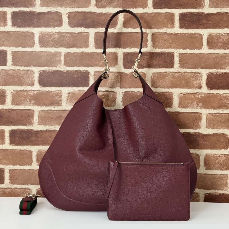 G*u*i top handle bags